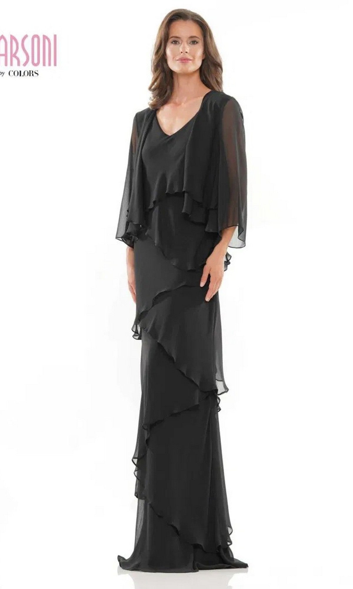 A woman stands facing forward against a white background, wearing the Marsoni M309 Long Formal Dress in black chiffon with sheer sleeves.